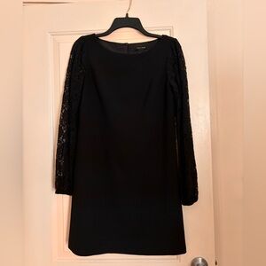WHBM mini black dress with long lace sleeves. Size 2. Extremely flattering.